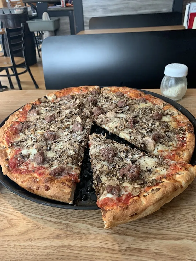 Large Pizza with Hamburger and Mushrooms